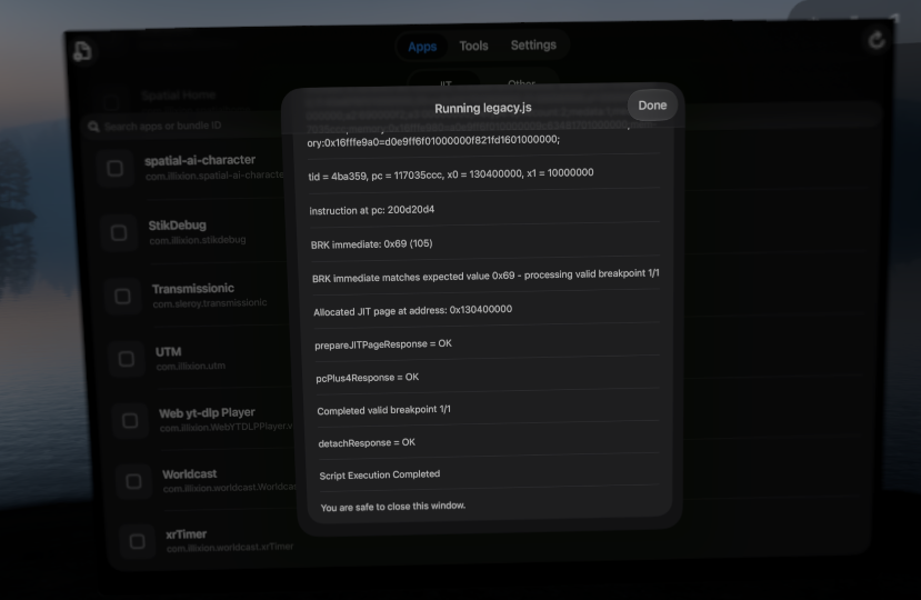 StikDebug on Vision Pro running its script for UTM